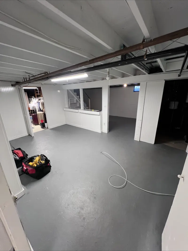 Basement finished end to end, before