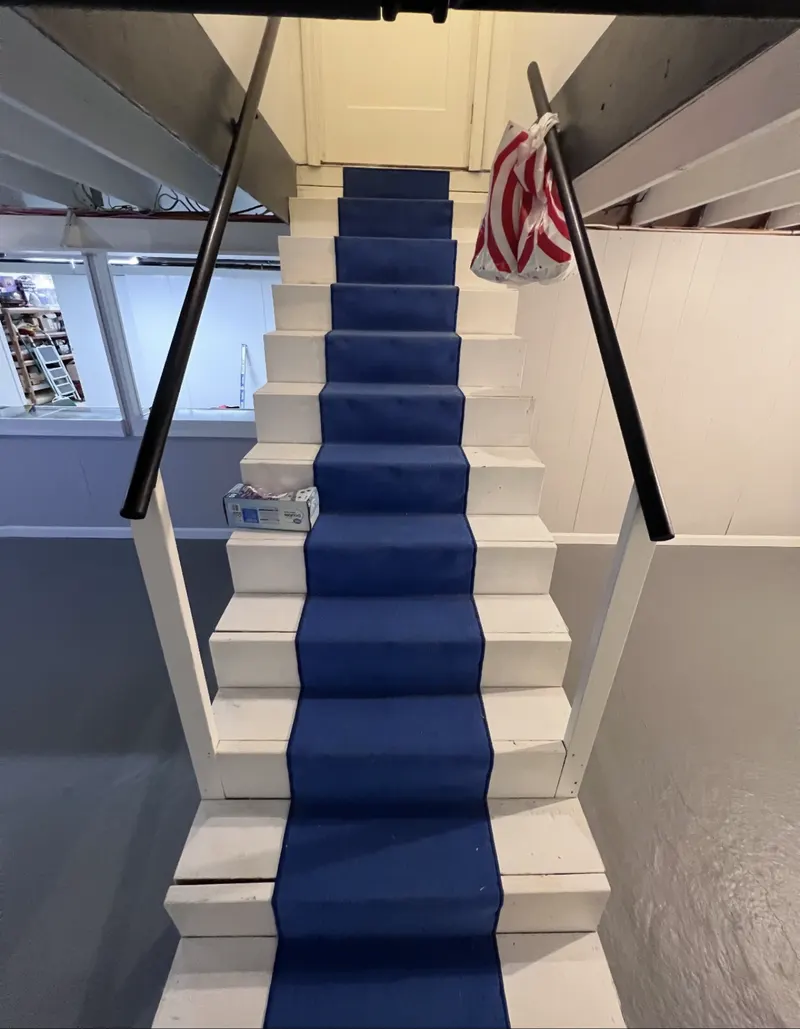 Basement stairs rebuilt in oak, before