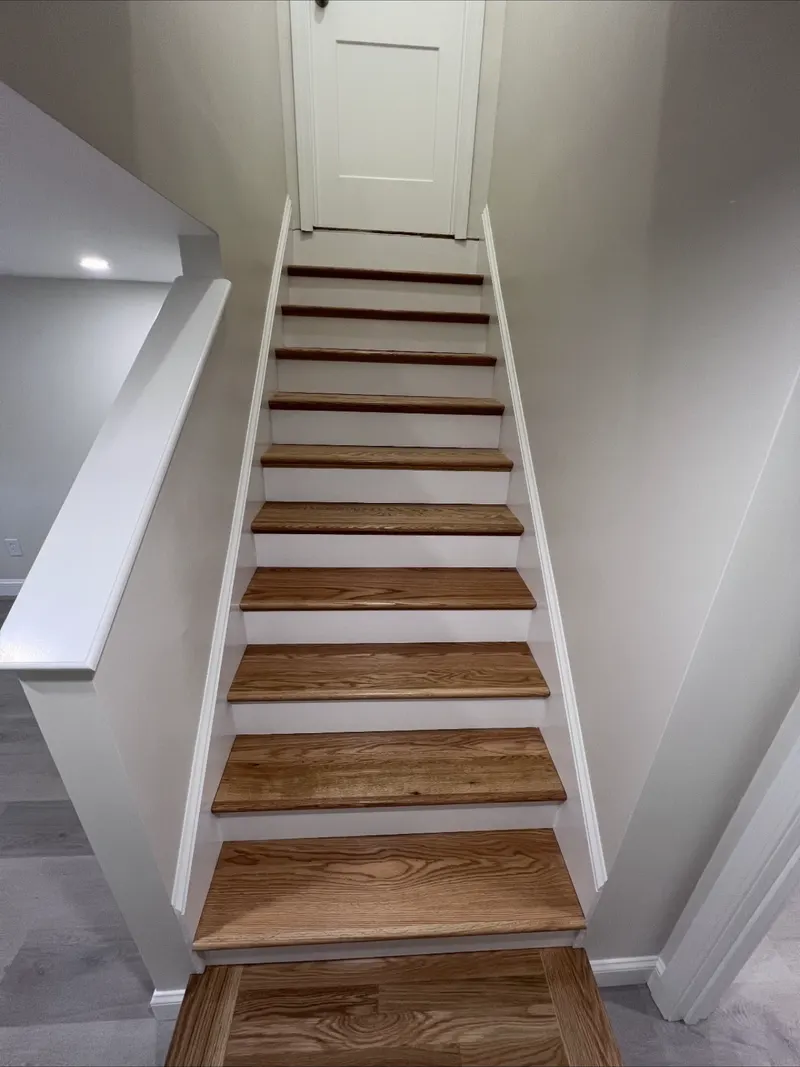 Basement stairs rebuilt in oak, after