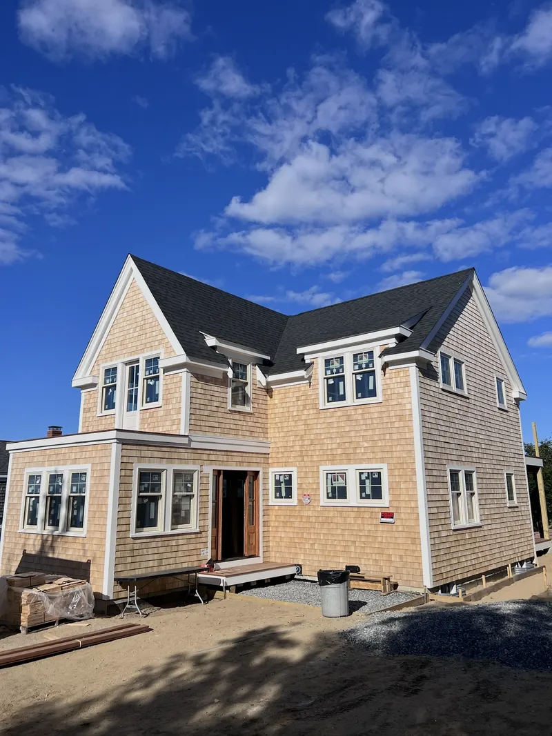 New build — cedar shingle and trim, after