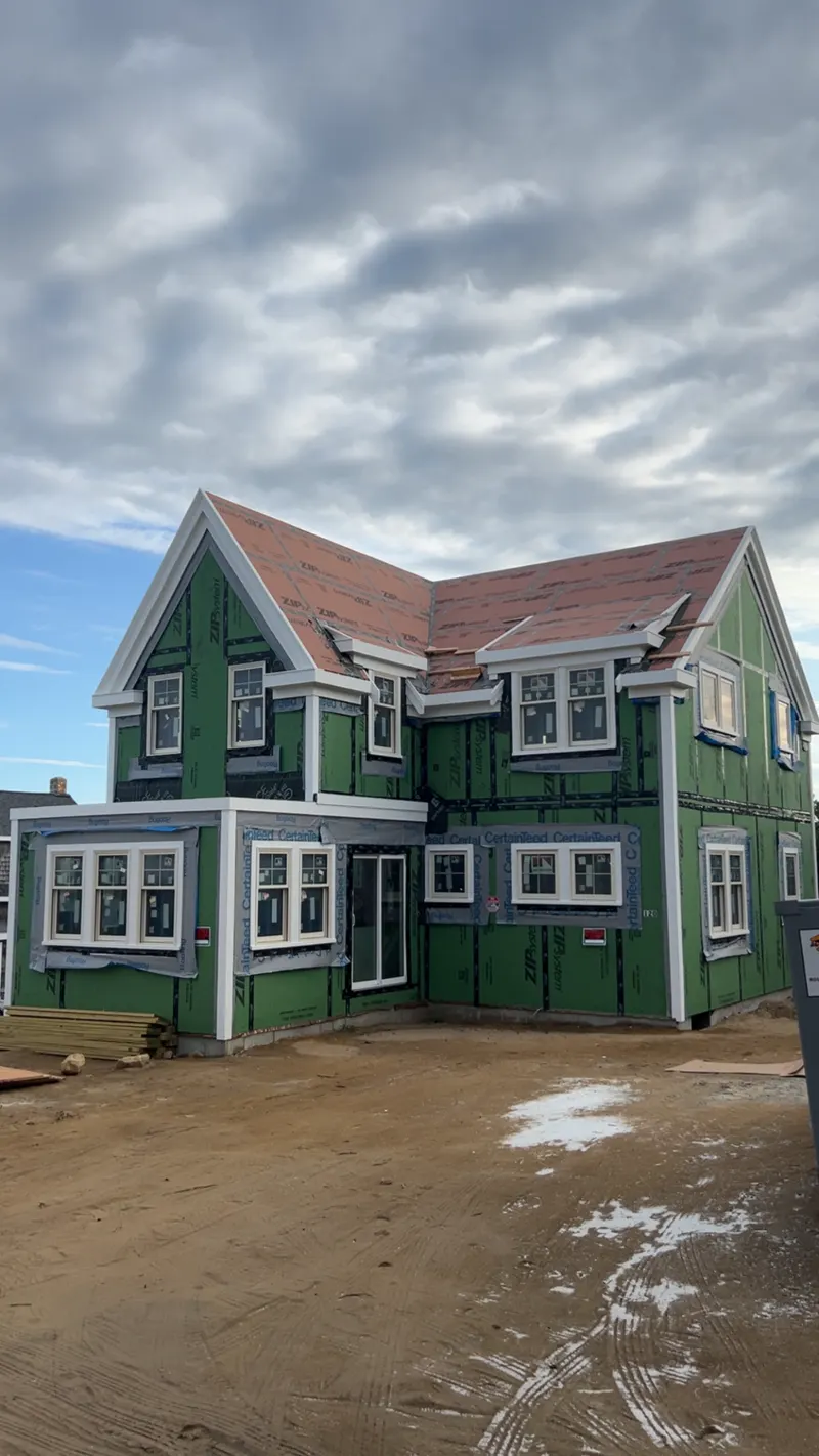 New build — cedar shingle and trim, before